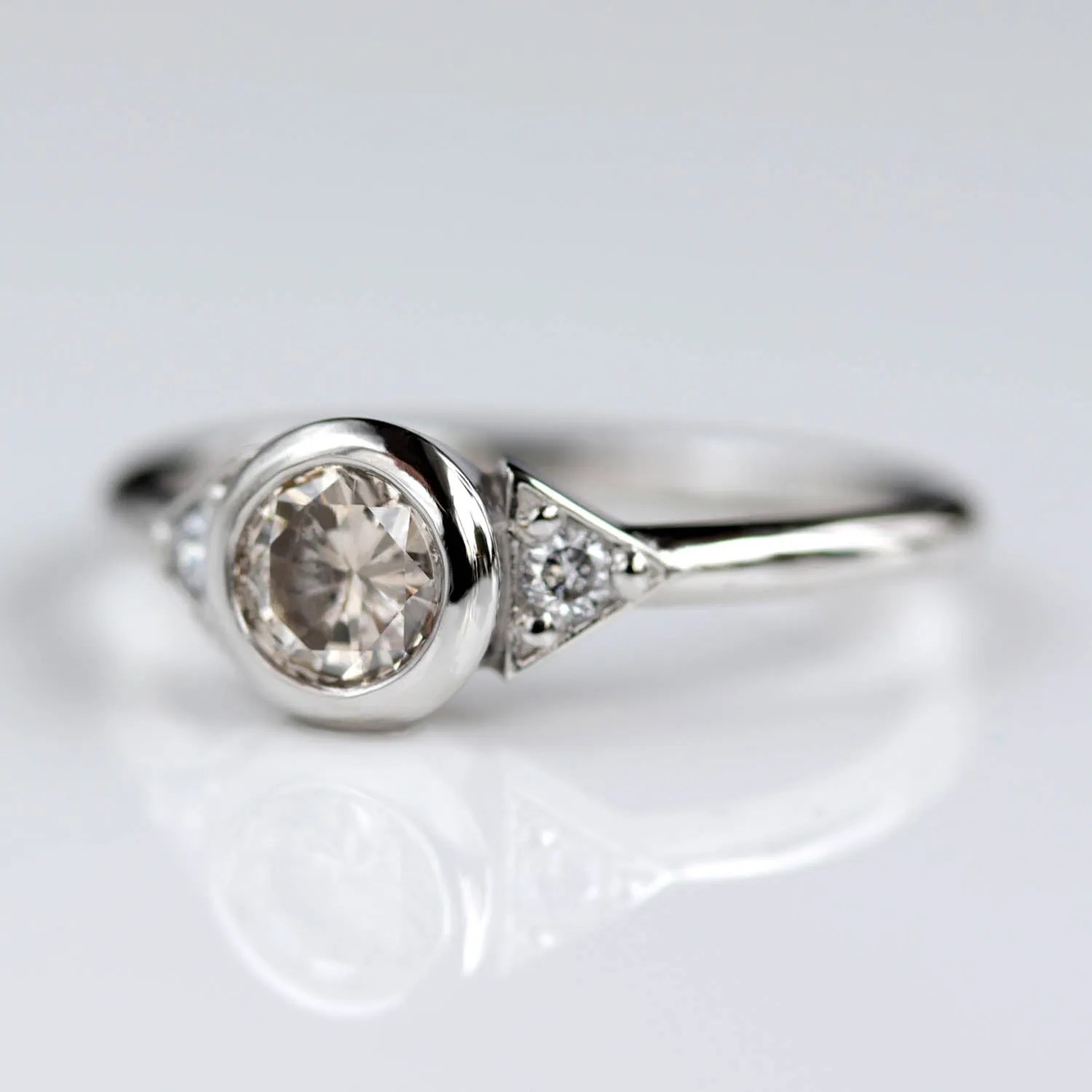 Deco Three Stone Ring with recycled Light Champagne Diamond