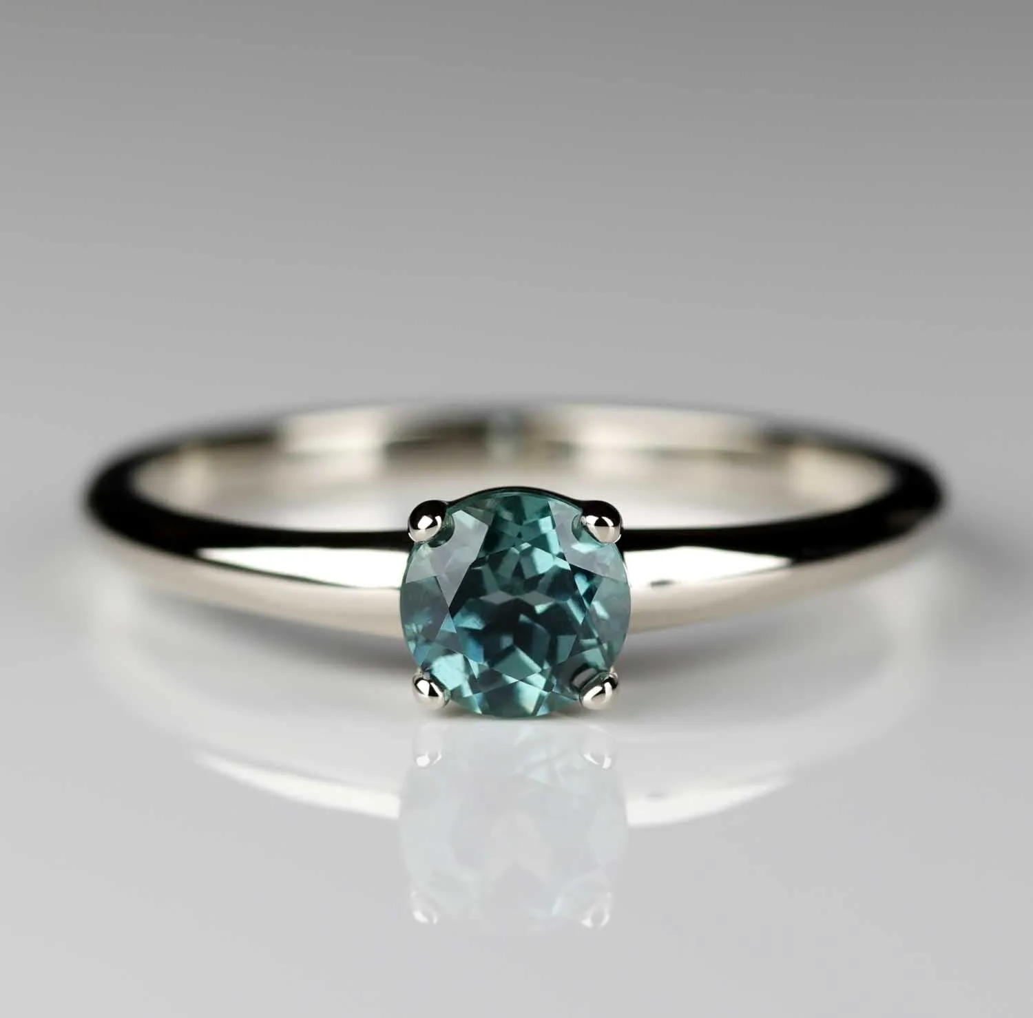 Low Base Four-Prong Solitaire with Malawi Sapphire